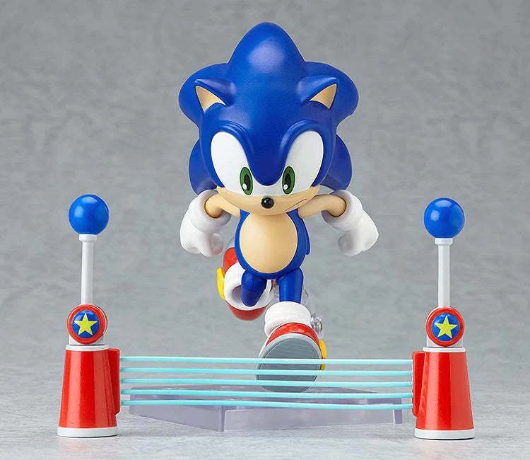 Nendoroid Sonic the Hedgehog figure posed running over the halfway point marker accessory.