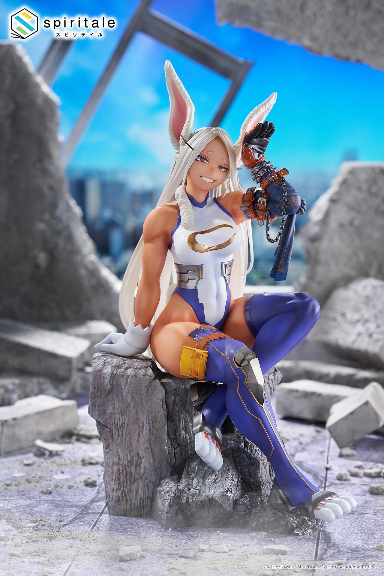 Wide promotional scene of the Mirko figure seated among city battlefield ruins under a blue sky.