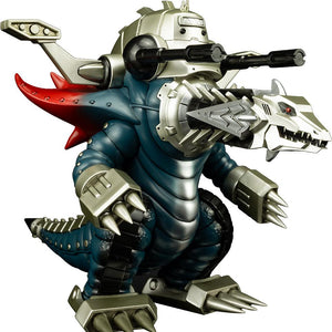 A full-body studio shot of the Mecha Ghoulghilas chibi figure showing its drill-like head, mechanical cannons, and silver claws.