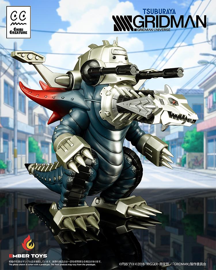 Chibi Creature Mecha Ghoulghilas figure displayed against a stylized anime city background from the SSSS.Gridman series.