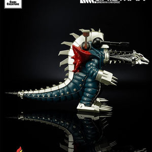 Side profile shot of the Mecha Ghoulghilas chibi statue showing the length of the drill head and the segmented mechanical tail.