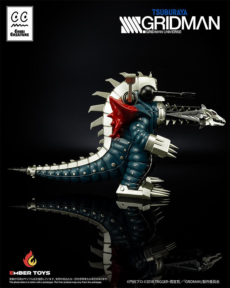 Side profile shot of the Mecha Ghoulghilas chibi statue showing the length of the drill head and the segmented mechanical tail.