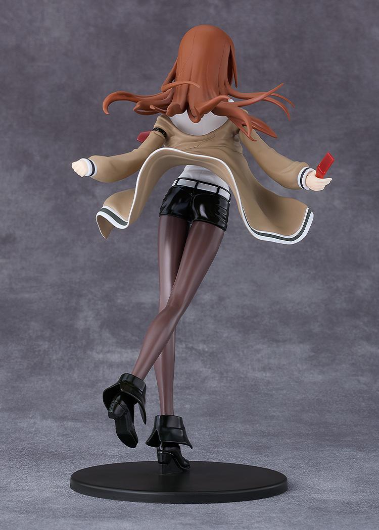 Rear view of the assembled Kurisu Makise model kit highlighting her trailing jacket, shorts, and flowing hair.
