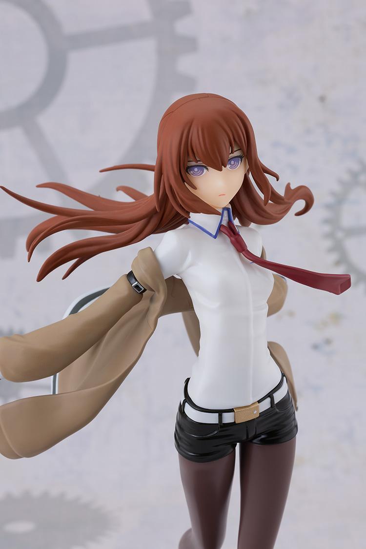Detailed upper-body close-up of the Kurisu Makise plastic model kit set against a gear pattern background.