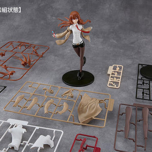 Unassembled plastic sprues and colored runners laid out beside the assembled Kurisu Makise model kit.
