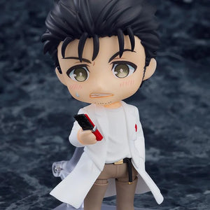 Close-up on the Nendoroid Rintaro Okabe 2.0 figure with the panicked face plate, holding the cellphone.