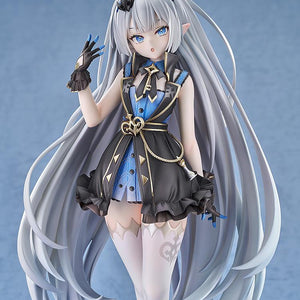 Close-up view of the Stella Sora Tyrant scale figure showing intricate gold chain accents, blue-tipped black gloves, and expressive blue eyes.
