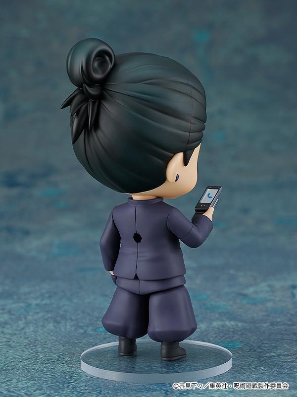 Rear studio shot of the Suguru Geto Nendoroid figure showcasing his styled black hair bun, strands along his neck, and dark navy uniform jacket.
