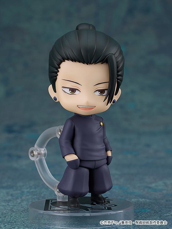 Full-body studio shot of the Suguru Geto Nendoroid figure standing on a custom clear base with a confident expression, wearing his dark navy high school uniform.