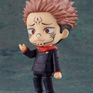 Sukuna Nendoroid head with cursed markings mixed and matched on Yuji Itadori's dark blue jujutsu high school uniform body.