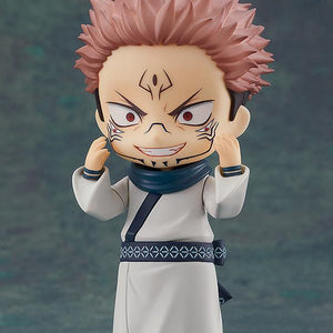 Close-up view of the Sukuna Nendoroid showcasing the crazed face plate with a wide, toothy grin and hands raised to his cheeks.