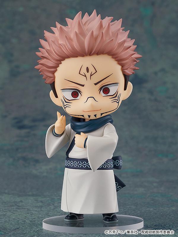 Full body front view of the Sukuna reissue Nendoroid collectible figure on a clear circular base showcasing his spiked pinkish-brown hair and facial markings.