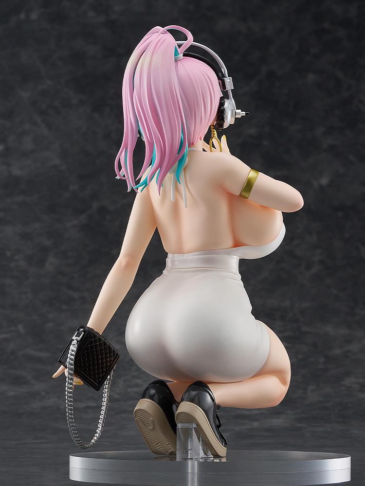 Rear view of the Super Sonico figure showing her long hair and the back of her white dress.