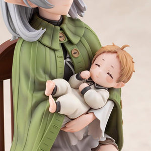 Angled upper-body close-up of Sylphiette Greyrat's green buttoned cape and baby Lucie Greyrat.