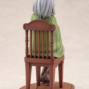 Rear view of the Sylphiette Greyrat 1/7 scale figure highlighting the sculpted wooden spindle chair, hair sculpt, and green cloak.