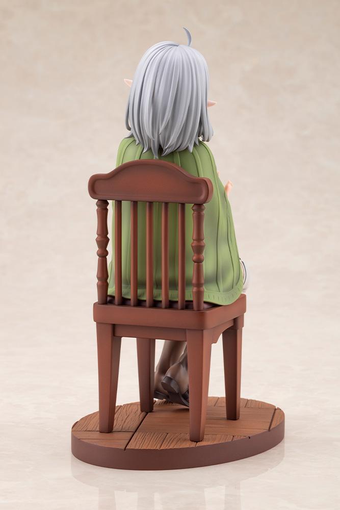 Rear view of the Sylphiette Greyrat 1/7 scale figure highlighting the sculpted wooden spindle chair, hair sculpt, and green cloak.