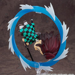 Side view of the Tanjiro Nendoroid executing a Water Breathing technique, showing the circular effect detail.
