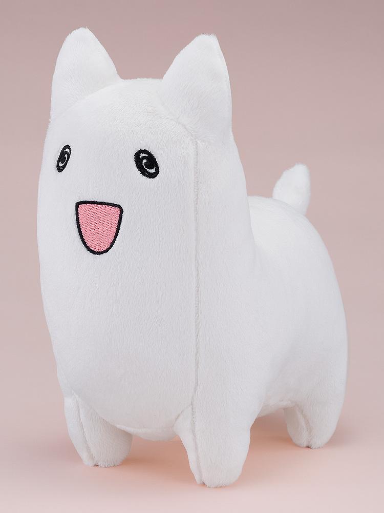 Three-quarter front view of the cute white Donguri plushie with embroidered facial features on a soft pink background.