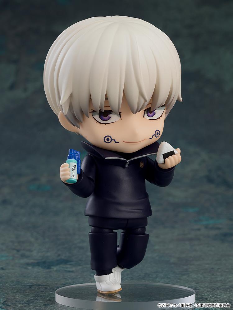 Smiling Toge Inumaki Nendoroid holding throat medicine and an onigiri rice ball accessory.