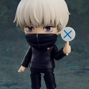 Toge Inumaki Nendoroid with closed neck warmer holding the blue X sign accessory.