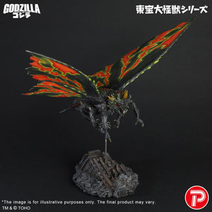 Low-angle dynamic view of the Battra Imago figure soaring above the destroyed Minato Mirai cityscape base.