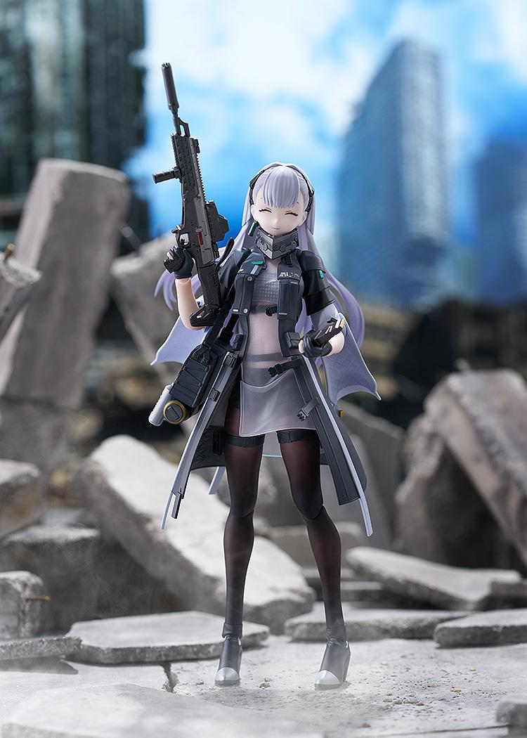 Tololo figma figure standing amidst ruined concrete city rubble, featuring a smiling expression while holding her Planeta assault rifle upright.