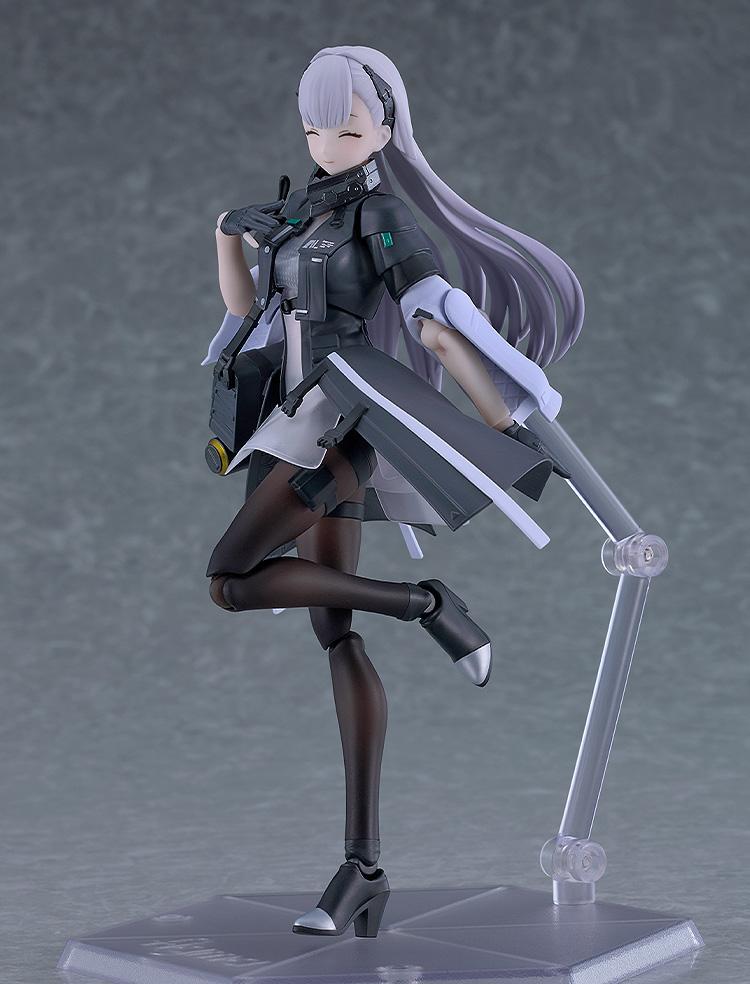 Playful, dynamic posing of the Girls' Frontline 2 Tololo figma figure showcasing the cute smiling face plate option with one leg raised.