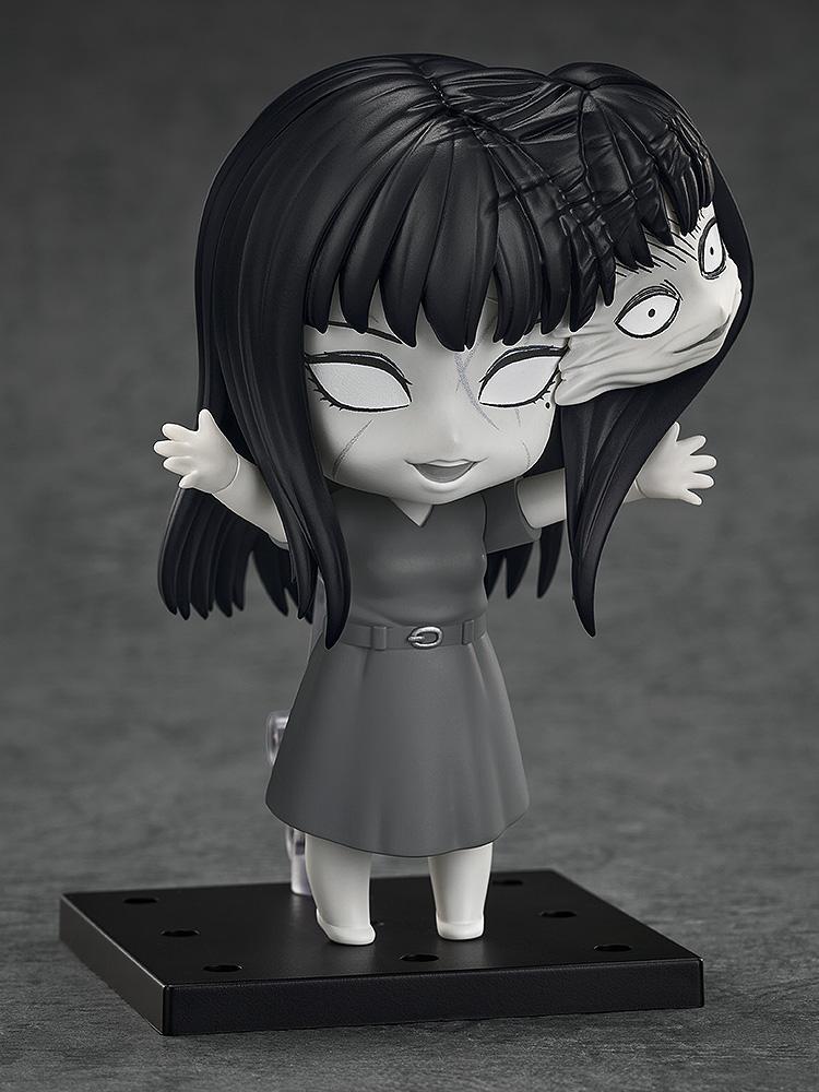 Nendoroid Tomie featuring the iconic horror-themed multiple faces part and white-out eyes.