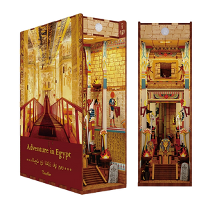 Product shot of the assembled Tonecheer DIY book end, showcasing the golden glow of the tomb interior and the Egyptian art on the walls.