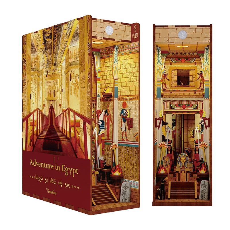 Product shot of the assembled Tonecheer DIY book end, showcasing the golden glow of the tomb interior and the Egyptian art on the walls.