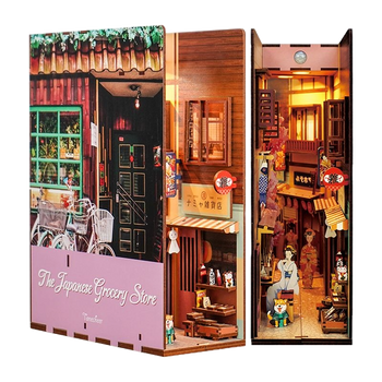 Product shot of the assembled Tonecheer DIY book end, showcasing the Japanese storefront and the warmly lit interior alley.