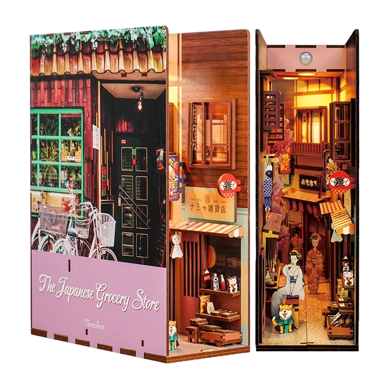 Product shot of the assembled Tonecheer DIY book end, showcasing the Japanese storefront and the warmly lit interior alley.