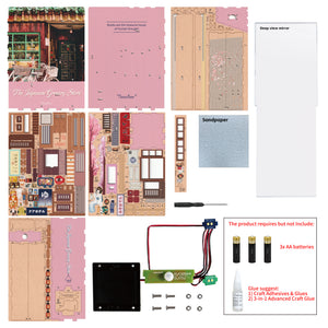 A layout of all the materials included in the Tonecheer book nook kit, showing the wooden punch-out sheets, mirror, and the LED light sensor wiring.