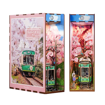 Product shot of the assembled Tonecheer DIY book end, showcasing the illuminated green tram and pink sakura trees in a Japanese setting.