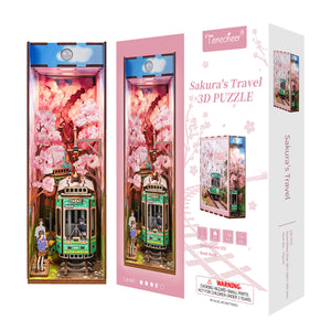 Packaging box for the Tonecheer Sakura's Travel 3D Puzzle, showing a final display image, 130 pieces, and the Body Sensor LED.