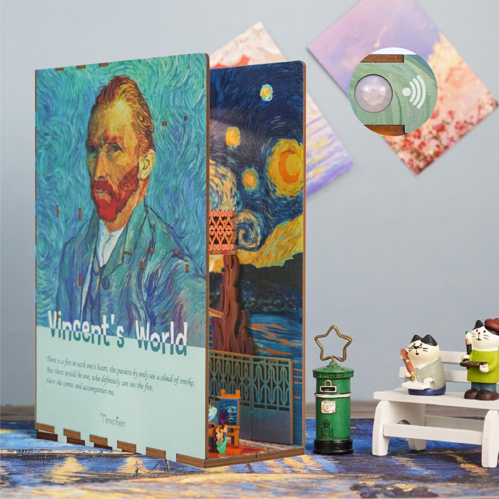 Close-up of the assembled book nook, highlighting the miniature Van Gogh portrait and the motion sensor LED light feature on the top.