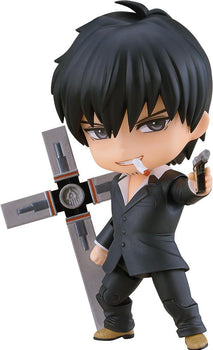 Isolated studio shot of the Trigun Maximum Nicholas D. Wolfwood Nendoroid figure holding the Punisher cross and aiming a pistol with a cigarette in his mouth on a white background.