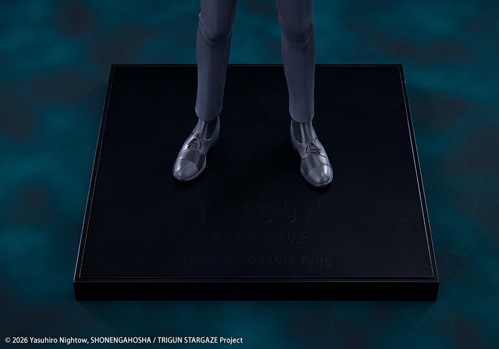 Close-up view of the black display base engraved with Trigun Stampede Livio the Double Fang title text
