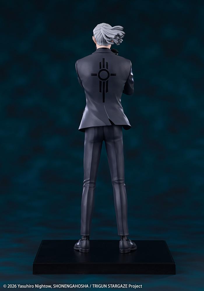 Rear view of the Livio the Double Fang figure showing the emblem printed on the back of his suit jacket
