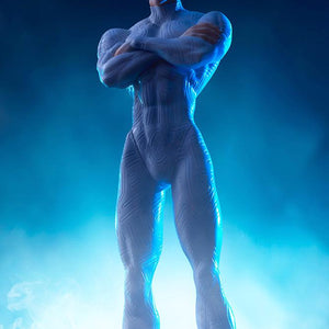 Low-angle shot of Kotobukiya Millions Knives figure illuminated with dramatic blue atmospheric lighting and mist