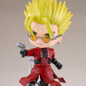 Vash the Stampede Nendoroid posed mid-stride aiming his signature silver revolver with the standard focused face plate.