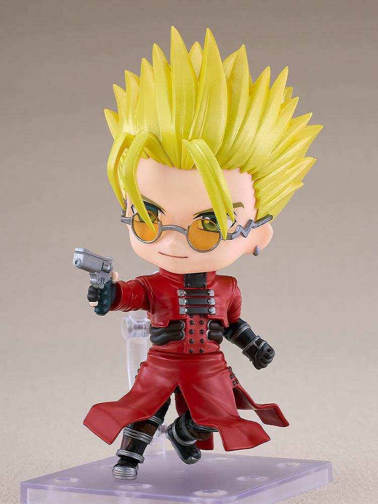 Vash the Stampede Nendoroid posed mid-stride aiming his signature silver revolver with the standard focused face plate.
