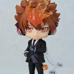 Full-body standing shot of the Tsuna Sawada Nendoroid in a formal black suit with X-Headphones.