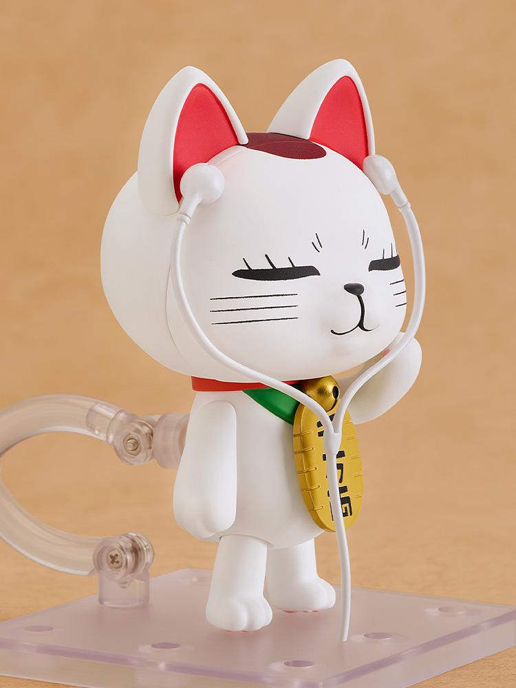 Turbo Granny Nendoroid in cat form wearing white earphone accessories and a concentrating face.