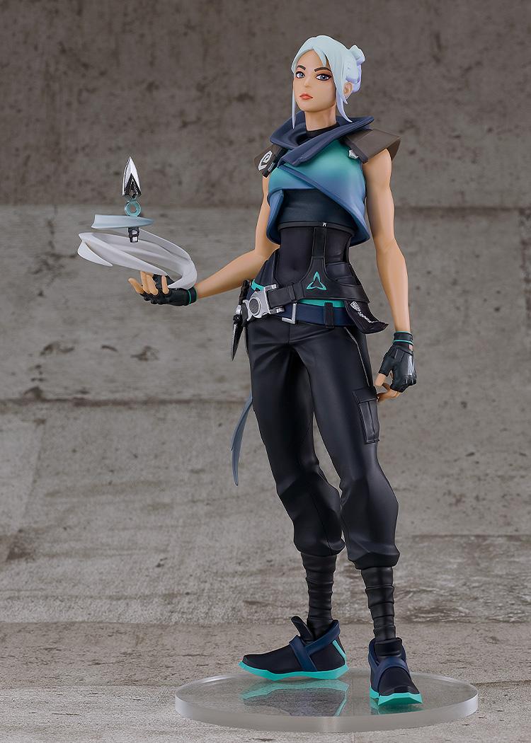 Full body front view of Valorant Jett Pop Up Parade SP figure standing on clear base against concrete wall backdrop