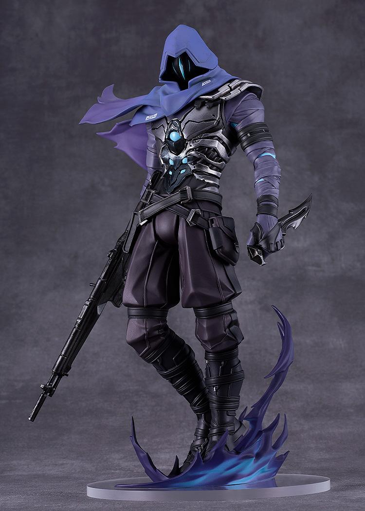 Three-quarter view of the Omen plastic figure, highlighting the detailed texture of his armor and flowing purple cape.