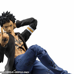 Close-up view of hatless Variable Action Heroes Trafalgar Law figure displaying spiky black hair, chest tattoo, and smirking expression.