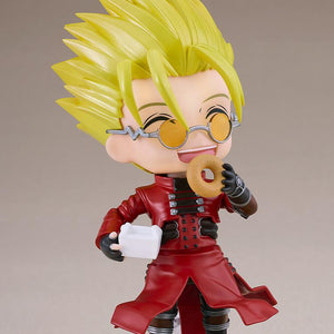 Trigun Vash the Stampede Nendoroid happily eating a donut while holding a takeout box with a joyful smiling face plate.