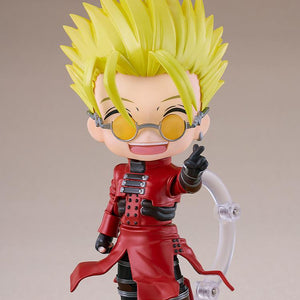 Vash the Stampede Nendoroid figure smiling happily while flashing the signature Love and Peace hand gesture.