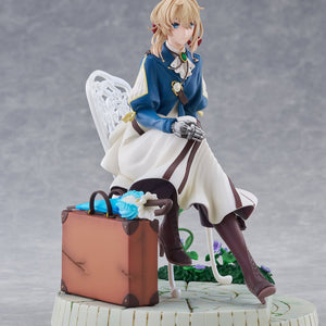 Three-quarter front view of the Taito Violet Evergarden DRESSTA statue figure with suitcase and umbrella accessory